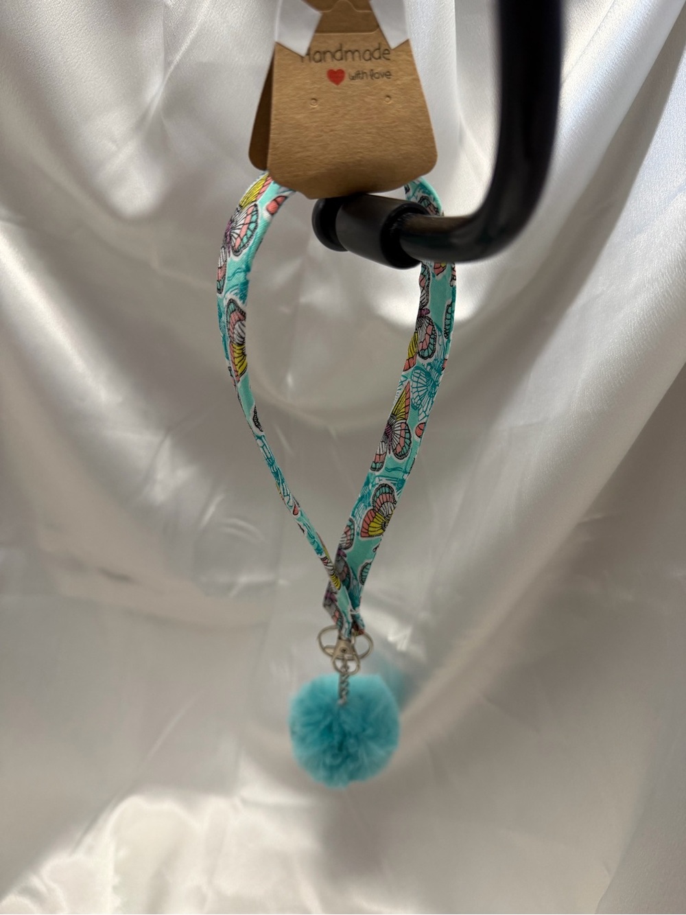 Handmade Rainbow Butterfly Pattern Wristlet Keychain with Bright Blue Pompom